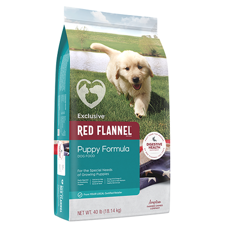 Red Flannel Puppy Formula Dog Food. White and teal pet food bag. Features white puppy.