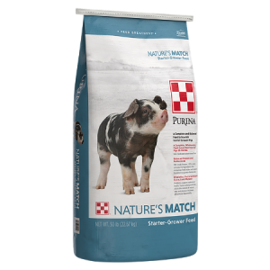 Teal and white 50-lb swine feed bag. Spotted pig. Purina Nature's Match Starter-Grower Pig Feed