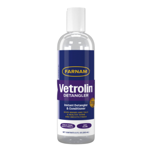 Farnam Vetrolin Detangler And Conditioner For Mane And Tail. Clear bottle with blue label.