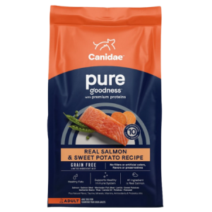CANIDAE Grain-Free PURE Limited Ingredient Salmon & Sweet Potato Recipe Dry Dog Food. Orange and blue dog food bag. Raw salmon. Raw sweet potato.