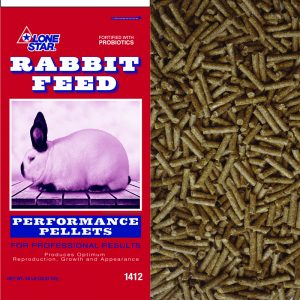 Pelleted rabbit feed. Red and blue feed bag. White rabbit, black ears.