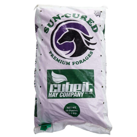 White feed bag with logo. Premium forage replacement cubes. Alfalfa cubes for cattle, horses, elk, and more.