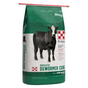 Green and white 50-lb feed bag. Black cow. Purina Safe Guard Cattle Dewormer.